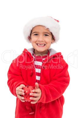 Cute little boy holding bauble