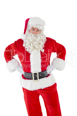 Cheerful santa claus with his hands on hips