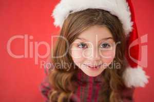 Happy little girl in santa hat