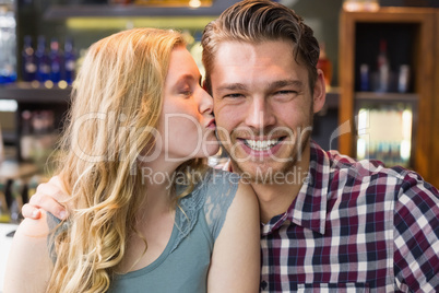 Young couple smiling at the camera