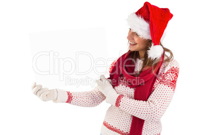 Festive brunette holding a poster