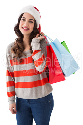 Beauty brunette posing with shopping bags