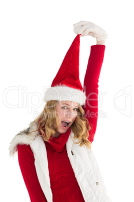 Cheering woman in santa hat