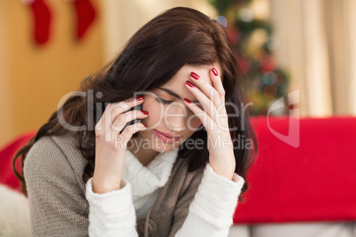 Concentrated brunette on the phone on christmas day