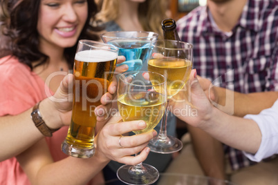 Young friends having a drink together