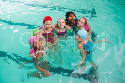 Cute little kids in the swimming pool