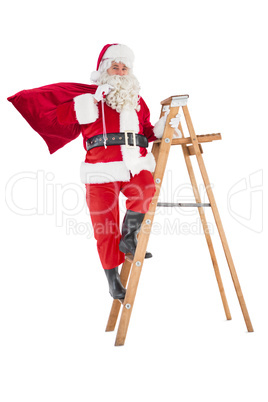 Santa claus climbing a ladder