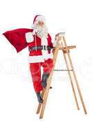 Santa claus climbing a ladder