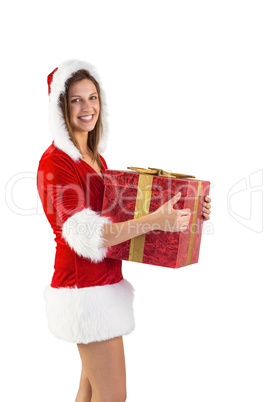 Festive girl holding a gift