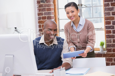 Business people using digital tablet in office