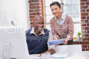 Business people using digital tablet in office