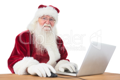 Santa surfs on the internet