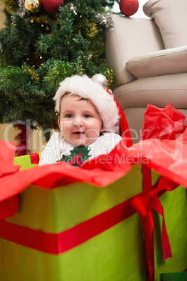 Cute baby boy in large christmas present