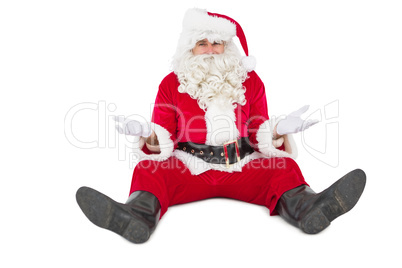 Doubtful santa sitting alone
