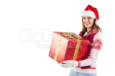 Girl standing while holding a present