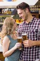 Young couple having a drink together