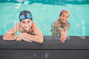 Cute swimming class in the pool