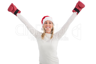 Festive blonde in boxing gloves