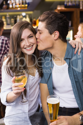 Young couple having a drink together