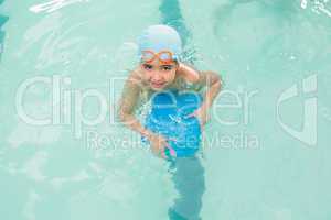 Cute little boy learning to swim