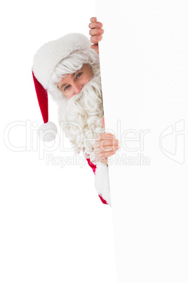 Smiling santa claus presenting sign