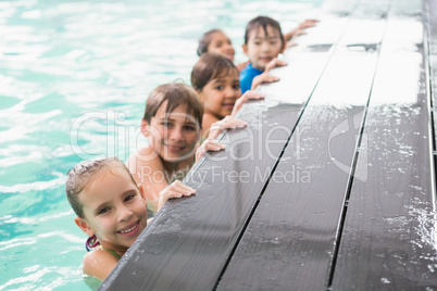 Cute swimming class at the pool