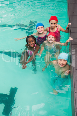 Cute little kids in the swimming pool