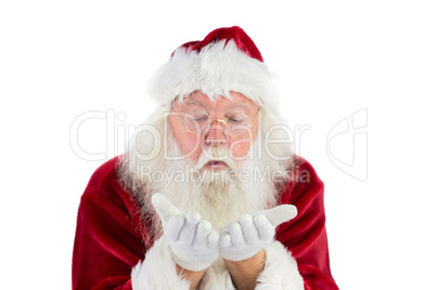 Santa Claus blows something away