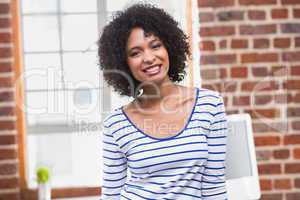 Portrait of smiling businesswoman in office