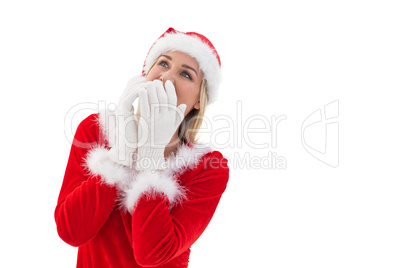 Festive blonde wearing white gloves