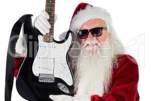 Father Christmas shows a guitar