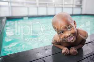 Little boy smiling in the pool