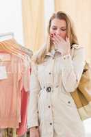 Pretty blonde woman tired during shopping