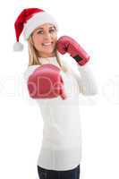 Festive blonde in boxing gloves