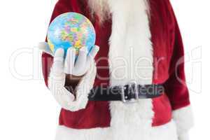 Santa has a globe in his hand