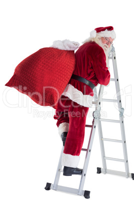 Santa steps up a ladder