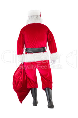 Rear view of santa claus holding a sack