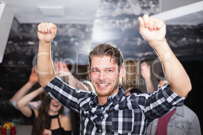 Stylish man smiling and dancing