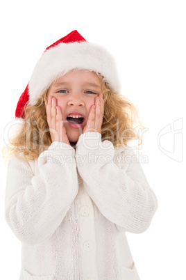 Festive little girl with hands on face