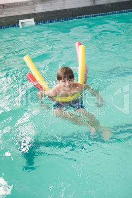 Little boy swimming in the pool