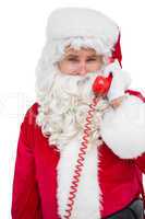 Smiling santa claus on the phone