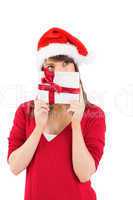 Festive young woman holding a gift