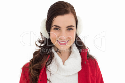 Portrait of a smiling brunette with winter wear