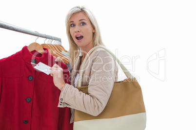 Pretty blonde shocked at price of jacket