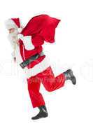 Santa claus walking with a sack