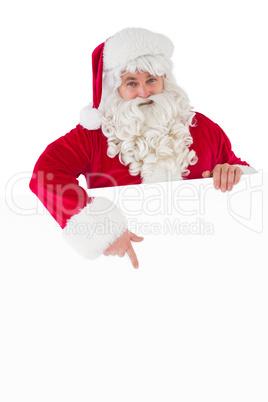 Happy santa claus presenting sign