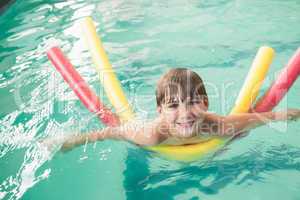 Little boy swimming in the pool