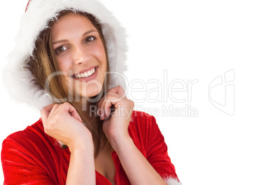 Pretty girl in santa outfit smiling at camera