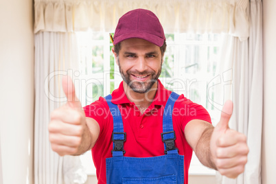 Construction worker showing thumbs up