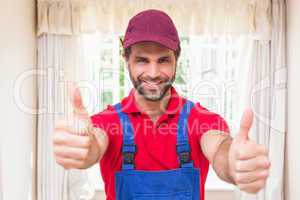 Construction worker showing thumbs up